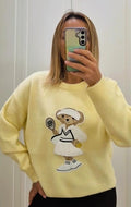 Pull teddy giallo